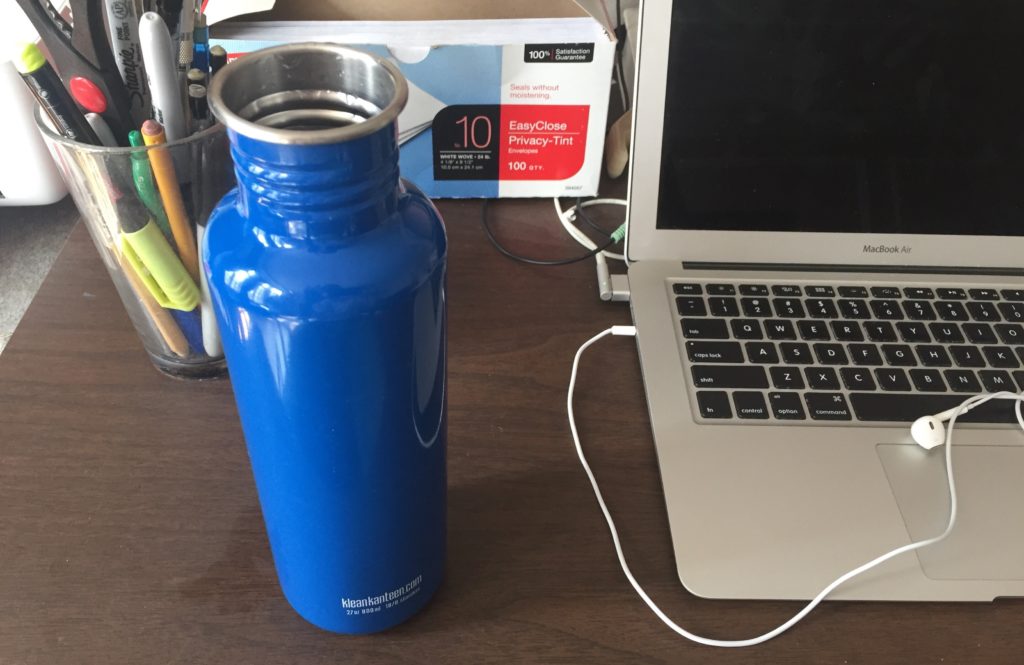 water bottle on desk transition to remote work